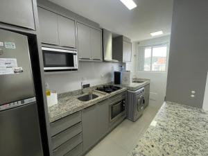 cód 157 - Apartamento á apenas 100 metros do mar!