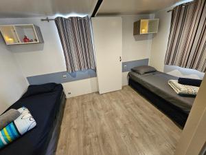 Campings Mobil home climatise 6 pers : photos des chambres