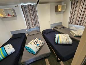 Campings Mobil home climatise 6 pers : photos des chambres