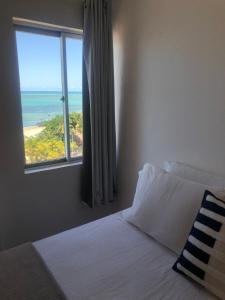 CT-82: Apto com vista espetacular para o mar