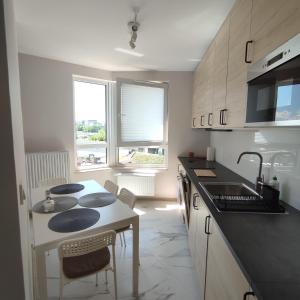 Apartamenty przy Mogilskiej z miejscem postojowym