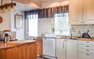 Beautiful Home In Rockneby With Kitchen