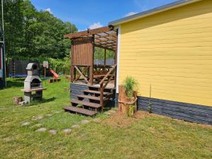 Domek letniskowy - żółty-całoroczny