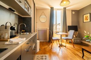 Appartements Dupain & Dubeurre Appart'hotel - Parking en supp : photos des chambres