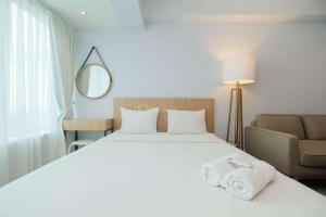 Modern and Spacious Studio Grand Kamala Lagoon Apartment By Travelio