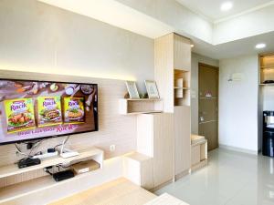 Best Deal and Comfortable 2BR Oasis Cikarang Apartment By Travelio