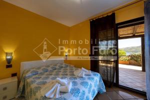 14B - Bilocale vista mare vicino alla spiaggia Porto Mannu