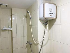 Comfort Stay 2BR at Springlake Summarecon Bekasi Apartment By Travelio