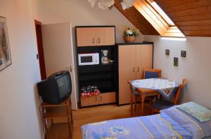 Studio Apartment room in Orchidea Apartman