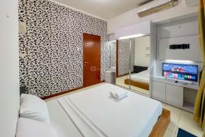 Cozy 1BR at Marbella Suites Dago Pakar Bandung Apartment By Travelio