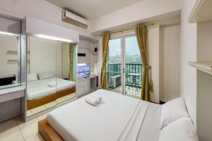 Cozy 1BR at Marbella Suites Dago Pakar Bandung Apartment By Travelio