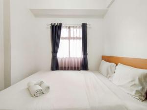 Modern 2BR at Apartment Suites @Metro By Travelio