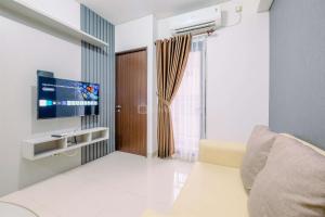 Good and Nice 2BR at Transpark Cibubur Apartment By Travelio