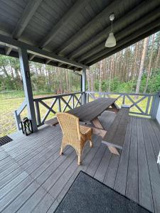 Młyńska Chata - drewniany, całoroczny dom w sosnowym lesie