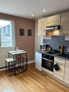 Appartements Entre gare et centre-ville : photos des chambres