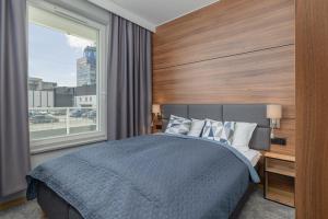 Nowoczesny Apartament z Parkingiem w Centrum Szczecina by Noclegi Renters