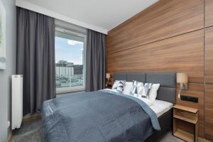 Nowoczesny Apartament z Parkingiem w Centrum Szczecina by Noclegi Renters