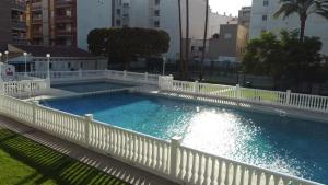 apartamento céntrico en 1ª línea de playa con piscinas y jardines