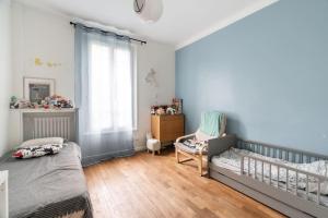 Appartements Charmante Maison au Raincy : photos des chambres