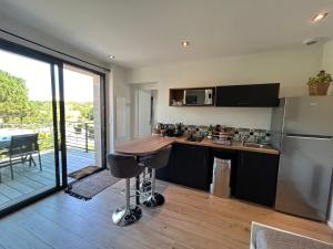 Appartement neuf T2 avec jardin et terrasses