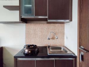 Modern Studio Design at Harvard Jatinangor Apartment By Travelio