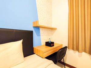 Classic Studio (No Kitchen) with City View at Lodge Paskal Apartment By Travelio