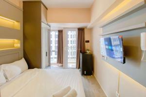 Good Deal and Lovely Studio at Tokyo Riverside PIK 2 Apartment By Travelio