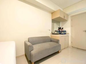 Simply Look and Enjoy Living Studio at Meikarta Apartment By Travelio