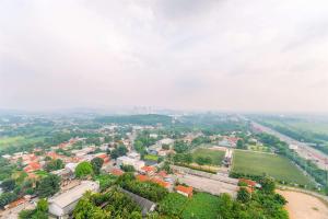 Homey and Minimalist 1BR Royal Sentul Park Apartment By Travelio