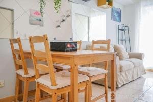 Spacious and Elegant 2BR M-Town Serpong Apartment By Travelio