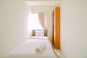 Warm and Cozy Living 2BR Bogorienze Apartment By Travelio