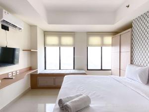 Simply Look Studio at Pollux Chadstone Apartment By Travelio