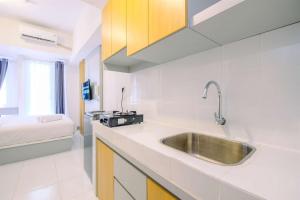 Well Furnished and Restful Studio Tokyo Riverside PIK 2 Apartment By Travelio