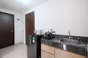 Wonderful 2BR at Transpark Cibubur Apartment By Travelio