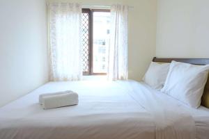 Scenic 2BR at Grand Setiabudi Apartment By Travelio