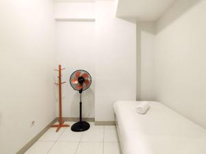 Modern 2BR at Mekarwangi Square Cibaduyut Apartment By Travelio