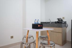New Furnished and Homey 2BR at Transpark Cibubur Apartment By Travelio