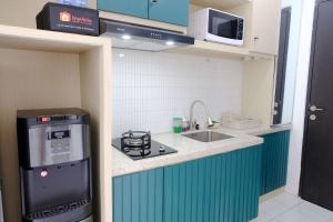 Comfortable and Nice 2BR at Grand Asia Afrika Apartment By Travelio