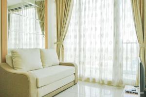 Wonderful Studio Apartment at Tree Park City BSD By Travelio