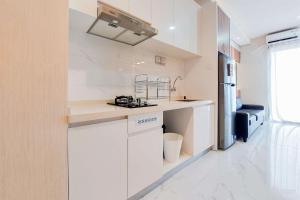 Well Designed and Comfy 2BR Sky House BSD Apartment By Travelio