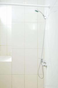 Fully Furnished with Comfortable Design 3BR Asatti Apartment By Travelio