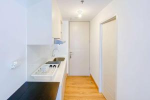 Good Price and Homey Studio at Tokyo Riverside PIK 2 Apartment By Travelio