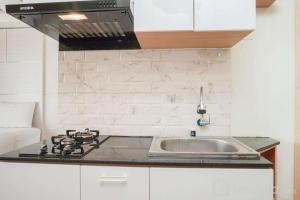 Modern Studio with City View Amethyst Apartment By Travelio