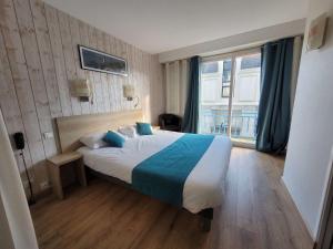 Hotels Brit Hotel des Halles : photos des chambres