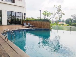 Furnished and Simple Living Studio Serpong Greenview Apartment By Travelio