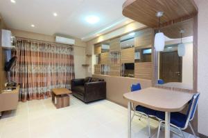 Simply Look 2BR at Bogor Valley Apartment By Travelio