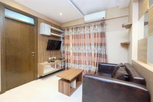 Simply Look 2BR at Bogor Valley Apartment By Travelio