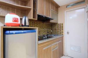 Simply Look 2BR at Bogor Valley Apartment By Travelio