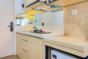 Cozy Designed Studio Tokyo Riverside PIK 2 Apartment By Travelio