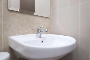 Fully Furnished and Cozy 2BR at Transpark Cibubur Apartment By Travelio